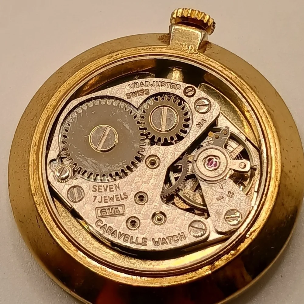 Caravelle Gold Toned Pendant Wind Up Watch